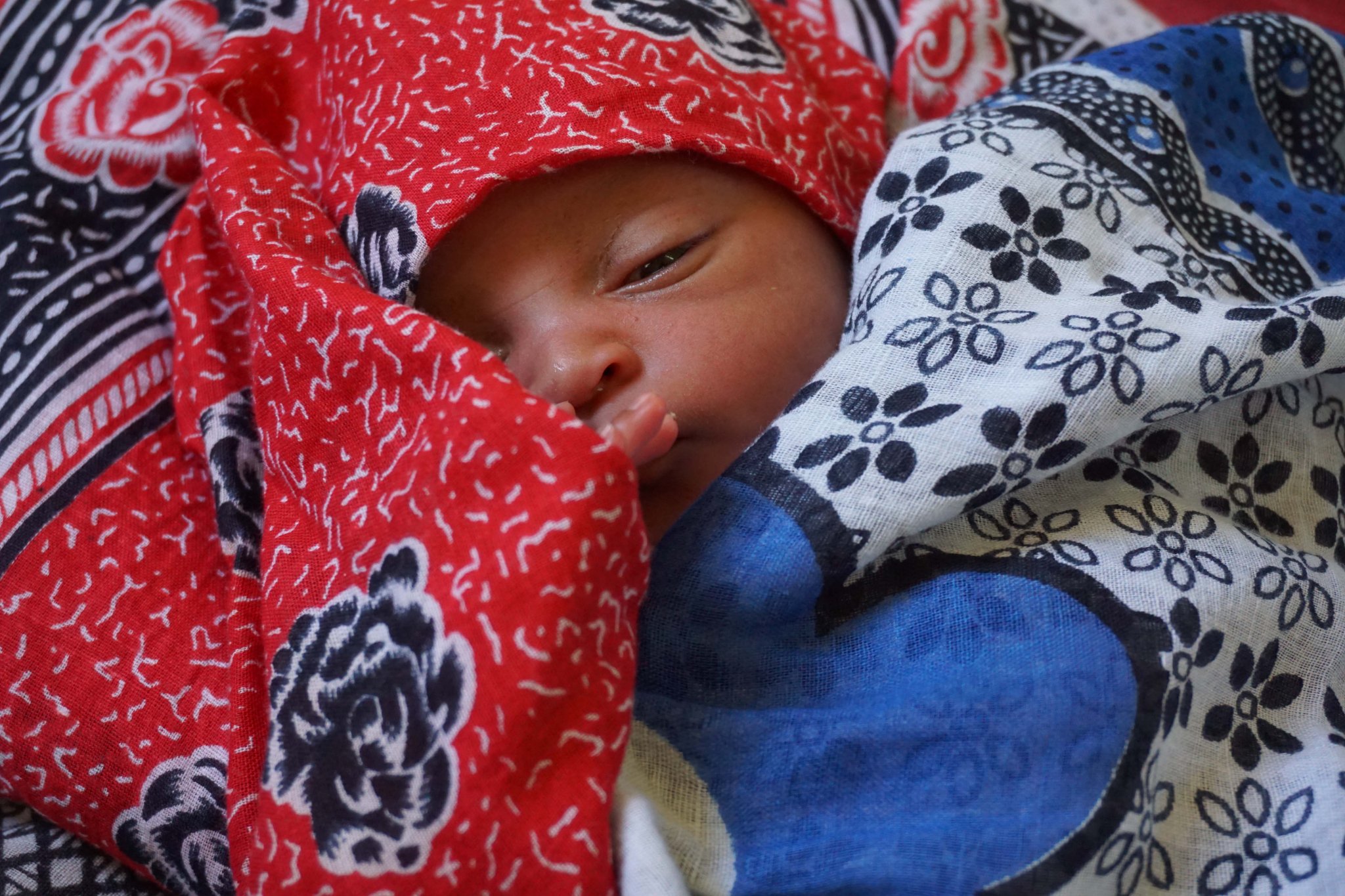 Newborn in Kivunge hospital, Zanzibar, Tanzania. Improving hospital architecture with an empathic approach can support quality of care and save lives.